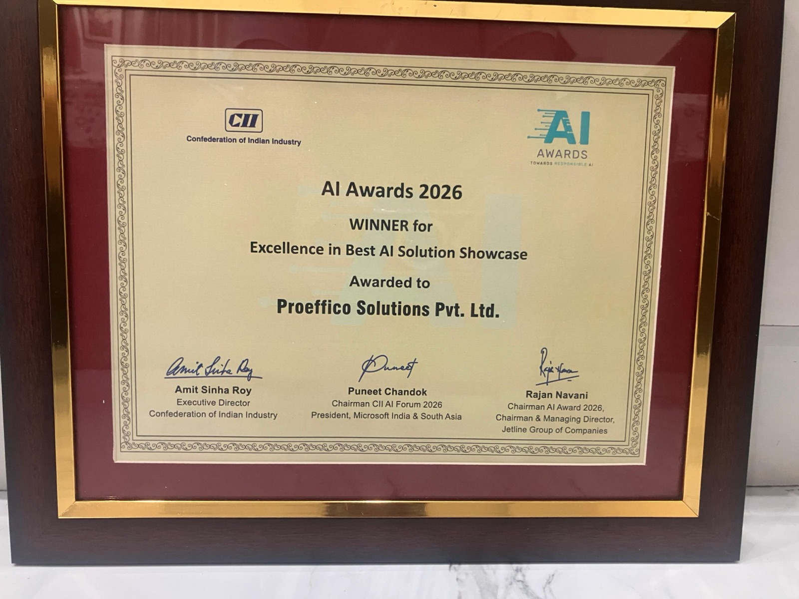 Framed CII AI Awards 2026 certificate: WINNER for Excellence in Best AI Solution Showcase, awarded to Proeffico Solutions Pvt. Ltd.