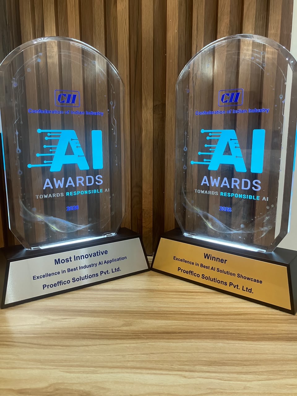 The two CII AI Awards 2026 trophies awarded to Proeffico Solutions Pvt. Ltd.: Most Innovative — Excellence in Best Industry AI Application, and Winner — Excellence in Best AI Solution Showcase