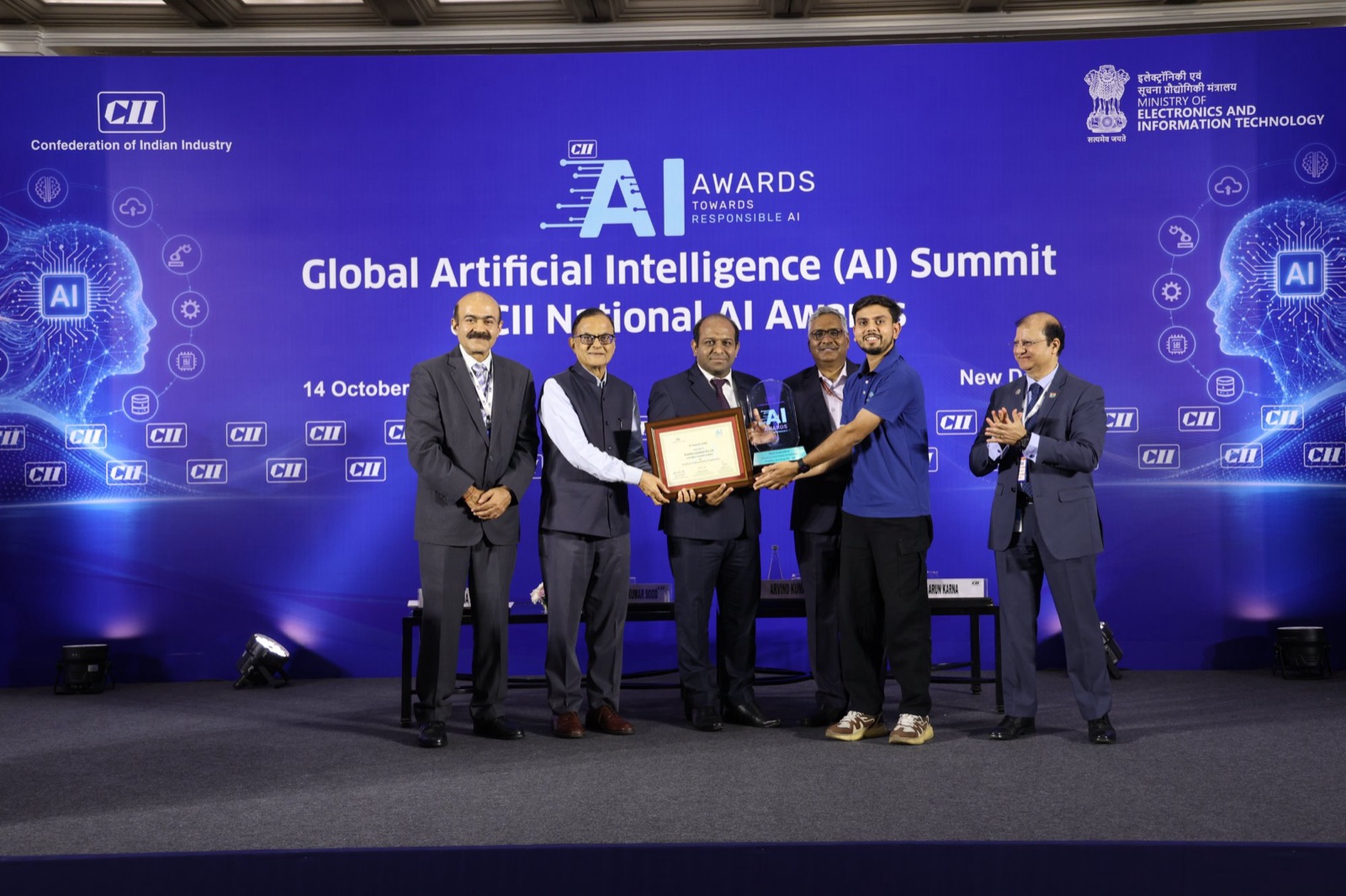 Proeffico Solutions receiving the CII National AI Awards 2026 on stage at the Global AI Summit, New Delhi, 14 October 2026